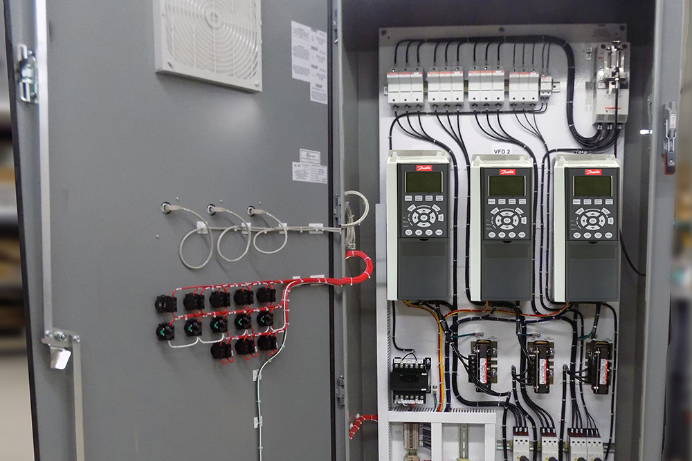 photo of an electrical box focused on Danfoss variable frequency drives