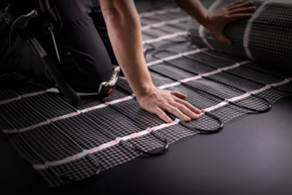 Plancher chauffant électrique ECinfracable : un chauffage au sol exceptionnel à vie