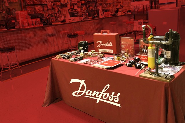 Counter event table set up with Danfoss products in red tones