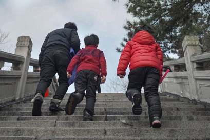 Persone che salgono le scale a Benxi