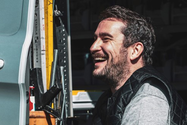 Danfoss Installer Heizungsbauer lachender Mann