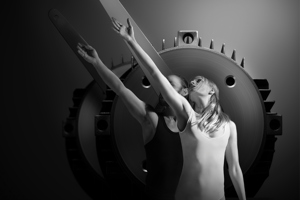 2 synchronized dancers in front of a motor