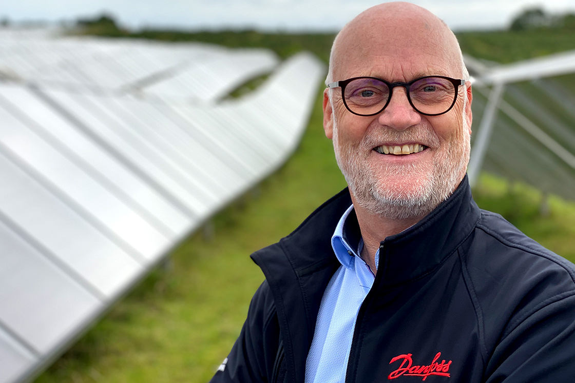 Key Account Manager, Danfoss Drives, Asbjørn Jonassen in front of sSolar panels