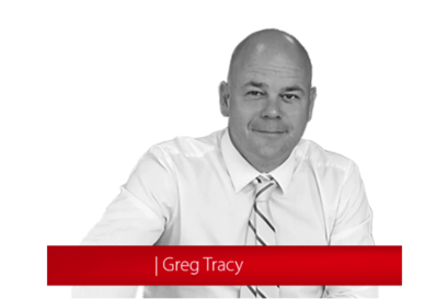 Headshot van Greg Tracy