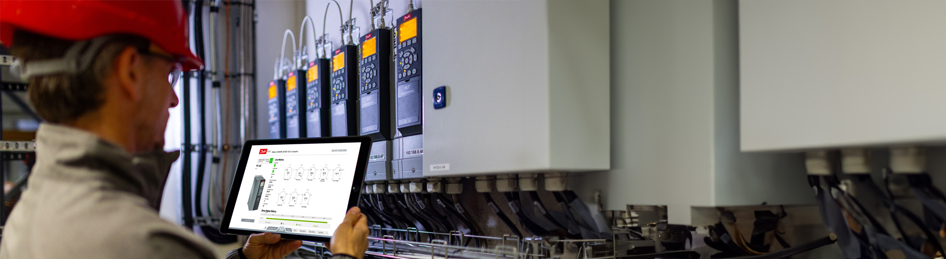 Person gathering spare parts at a Danfoss factory
