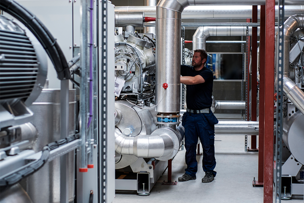 Man working with a heating system 