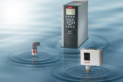A VLT drive, a sensor and a KPU temperature switch all floating on water with ripples coming from each products location. 
