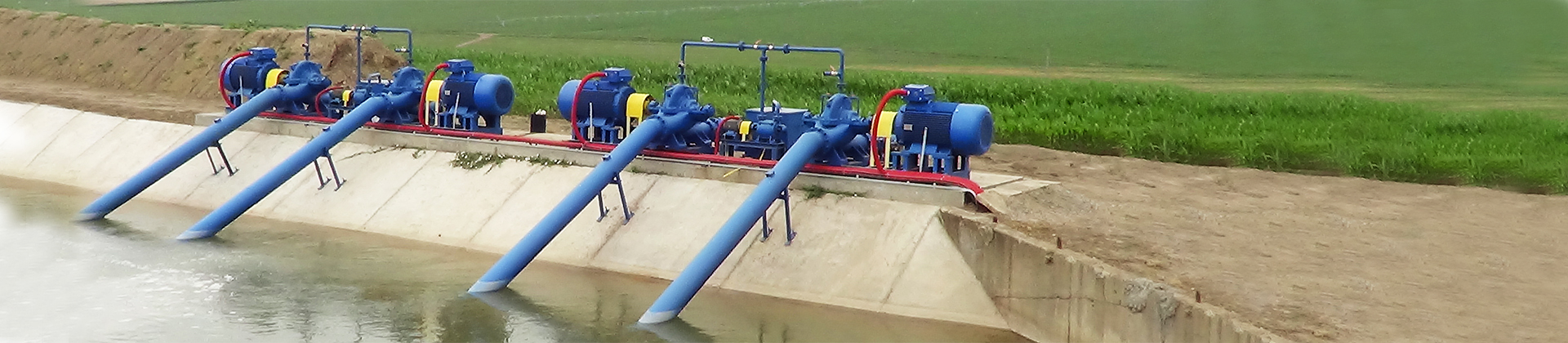 Pumps in a retention pond doing there work to irrigate the farm