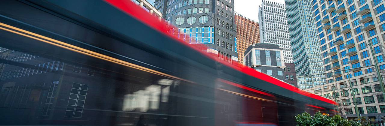 High speed transportation zooming back a city center representing automotive