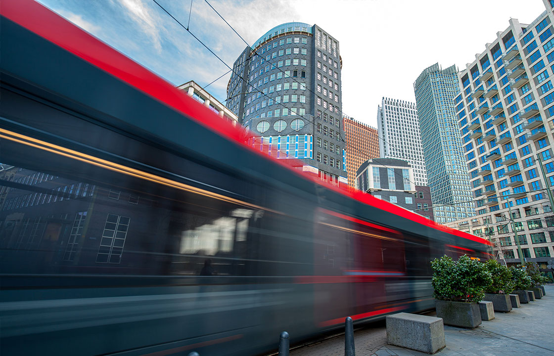 High speed transportation zooming back a city center representing automotive