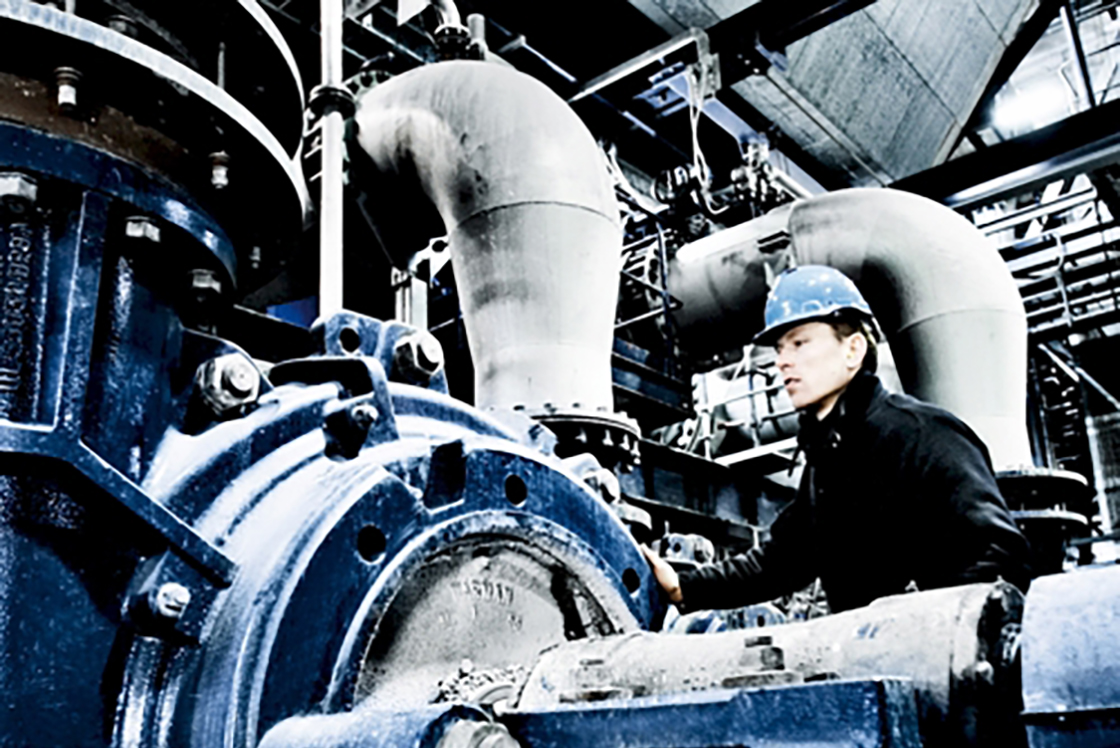 Man maintaining a motor