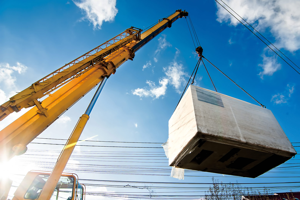 Crane moving a container