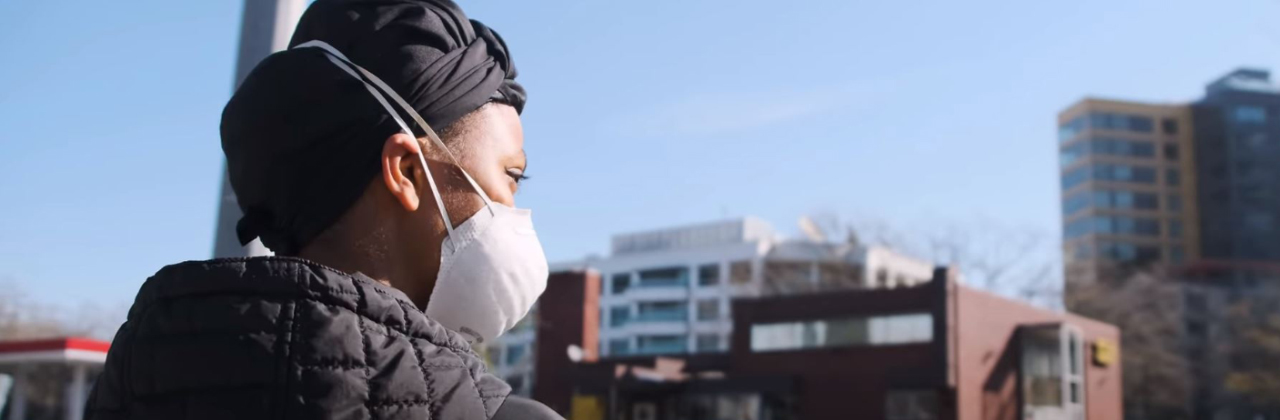 Women in in the city with mask covid-19