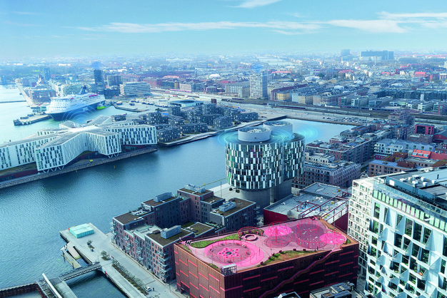 Vista aérea de Nordhavn, Copenhague, en la que se muestra una señal de monitorización basada en condiciones en la parte superior de varios edificios