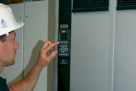 Man controlling the settings on a drive