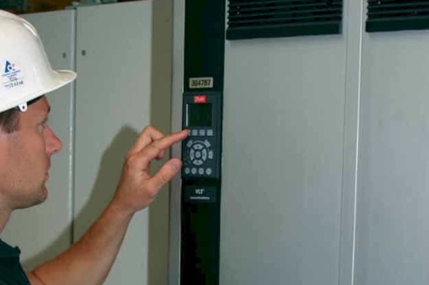 Man controlling the settings on a drive